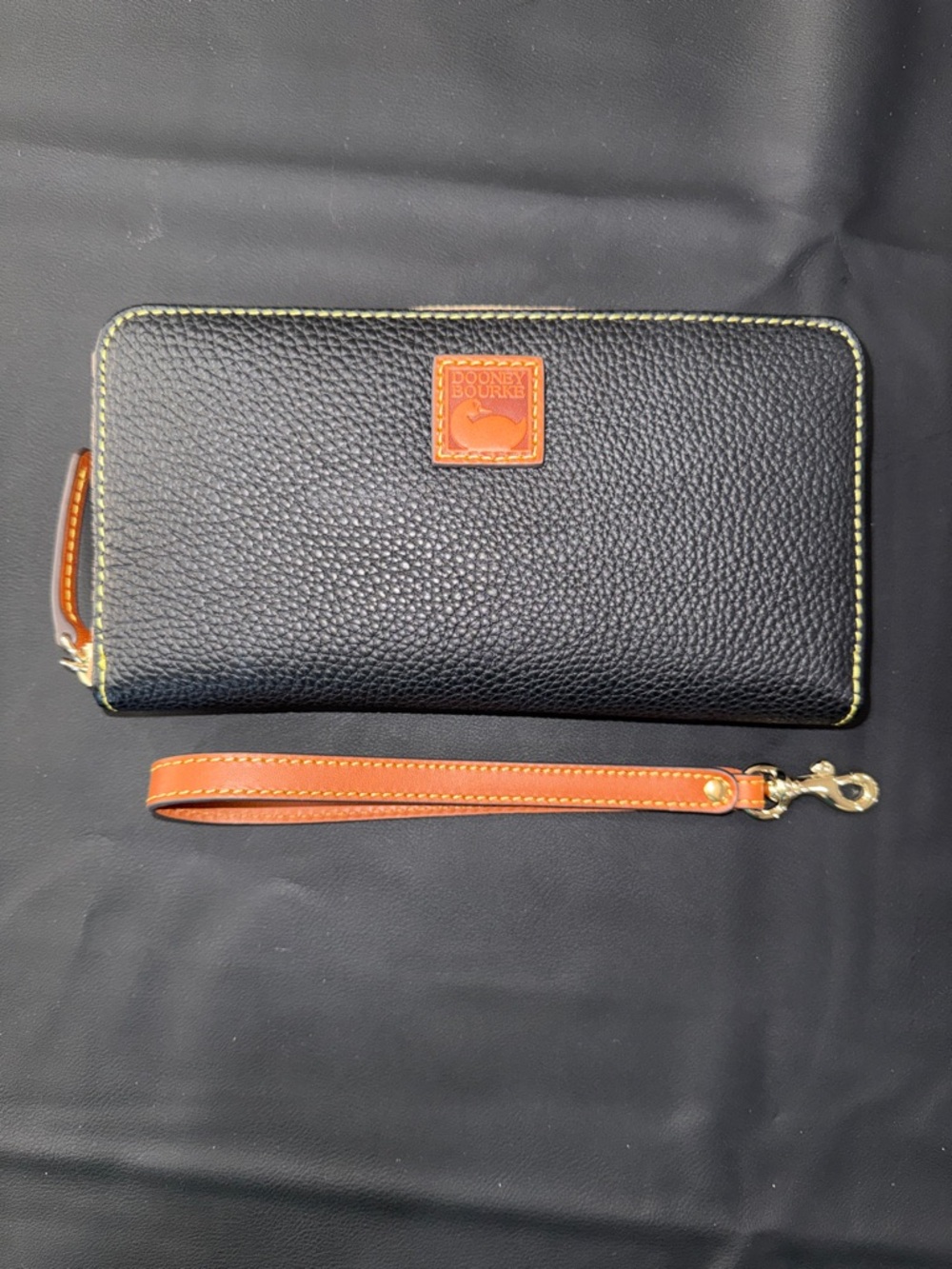 Dooney & Bourke NWT Black Pebbled Zip Wallet with Tan Wristlet strap